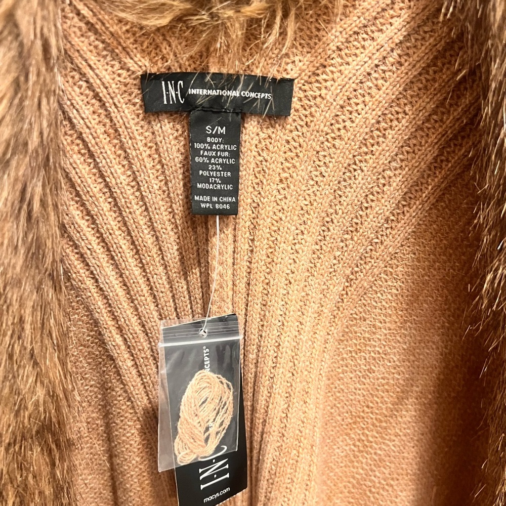 Camel color cape. Perfect for jeans and a turtleneck to make the perfect outfit.